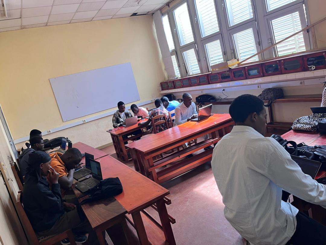 Students working in teams during the AlgoTech hackathon